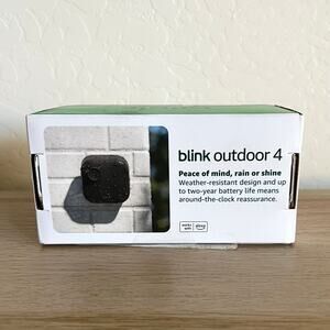 Blink Outdoor 4-Core Wireless Smart Security Camera System Camera & Sync Module